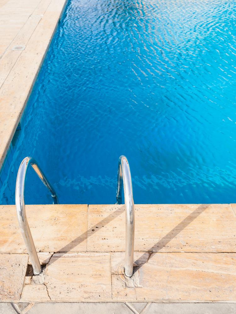 Refreshing Blue Pool with Lush Surroundings