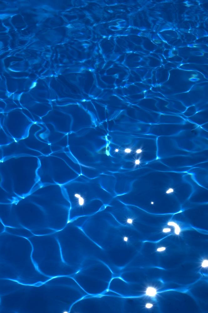 Pristine swimming pool reflecting the dedication of Seminole pool maintenance services
