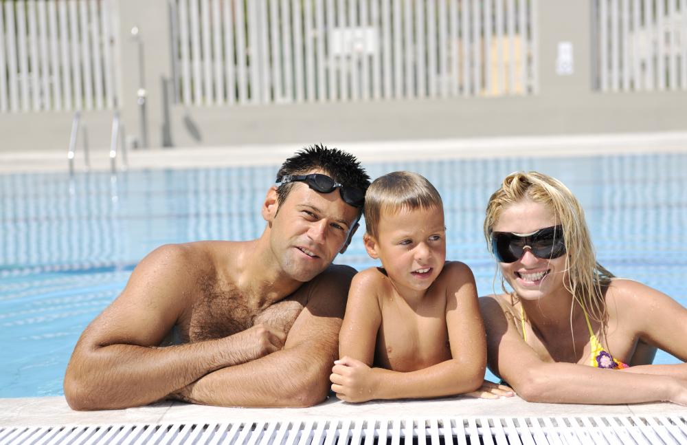 Family enjoying warmed pool in Daytona Beach thanks to efficient heat pump