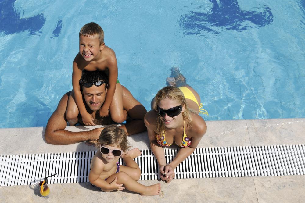 Family enjoying a heated swimming pool in Palm Coast