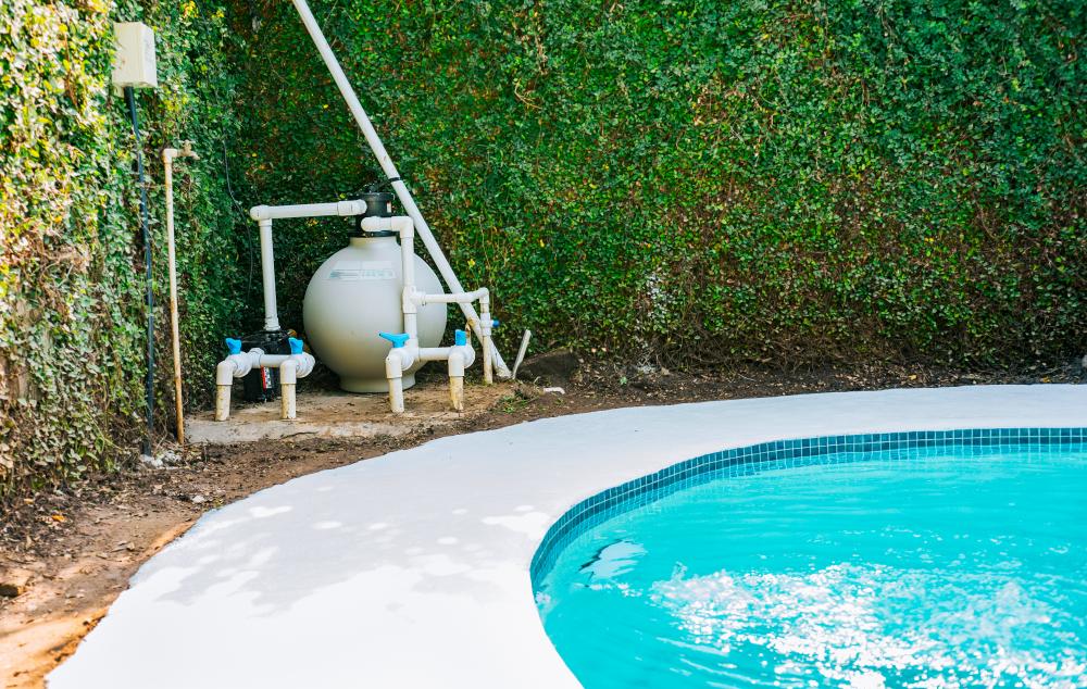 Efficient pool heat pump with sand filter installation